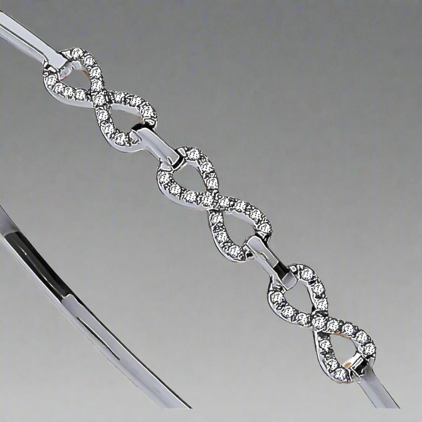 9ct White Gold Infinity Diamond Bangle 0.15ct -BARRETT JEWELLERY